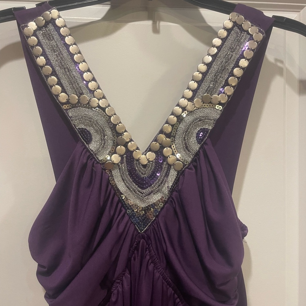 Bailey Blue size medium. Gorgeous plus colored dress with silver embellishments.
